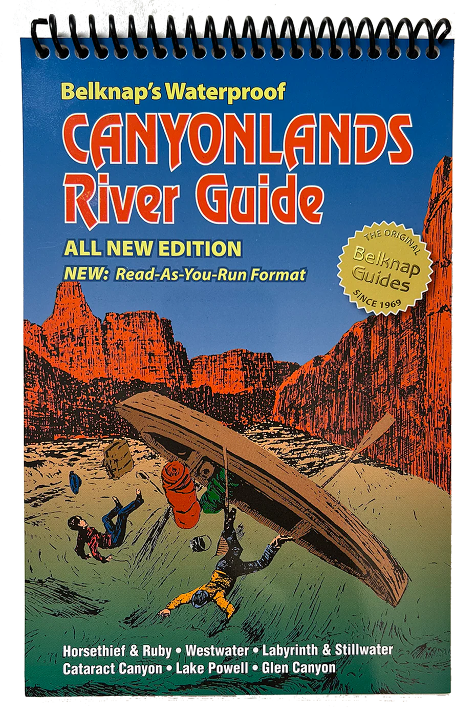 Cover of "Canyonlands River Guide" by Westwater Books, showing a capsized raft in a canyon, bold orange and yellow title, and spiral-bound top—an essential guide for every Colorado River adventurer.