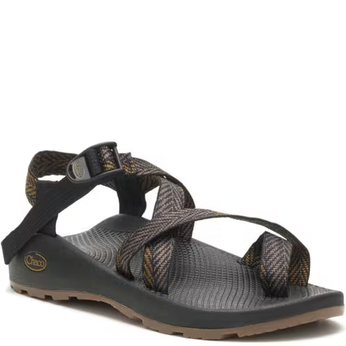 The Chaco Z2 Classic - Men's sandal features adjustable webbing straps and a supportive footbed, designed for outdoor use. Color: Black.
