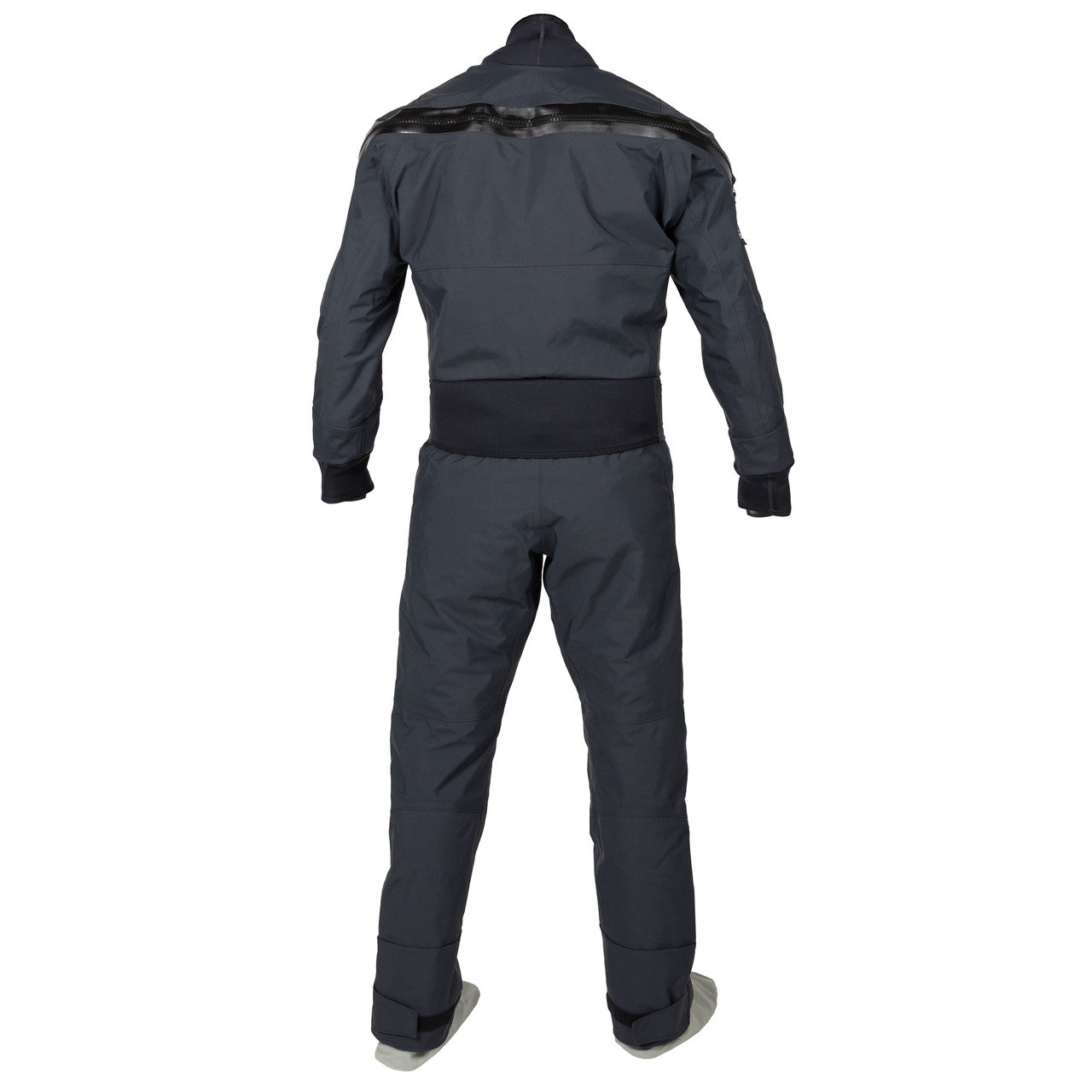 A person stands with their back to the camera, wearing a dark blue Kokatat Icon (Hydrus 3.0) Drysuit featuring a high collar.