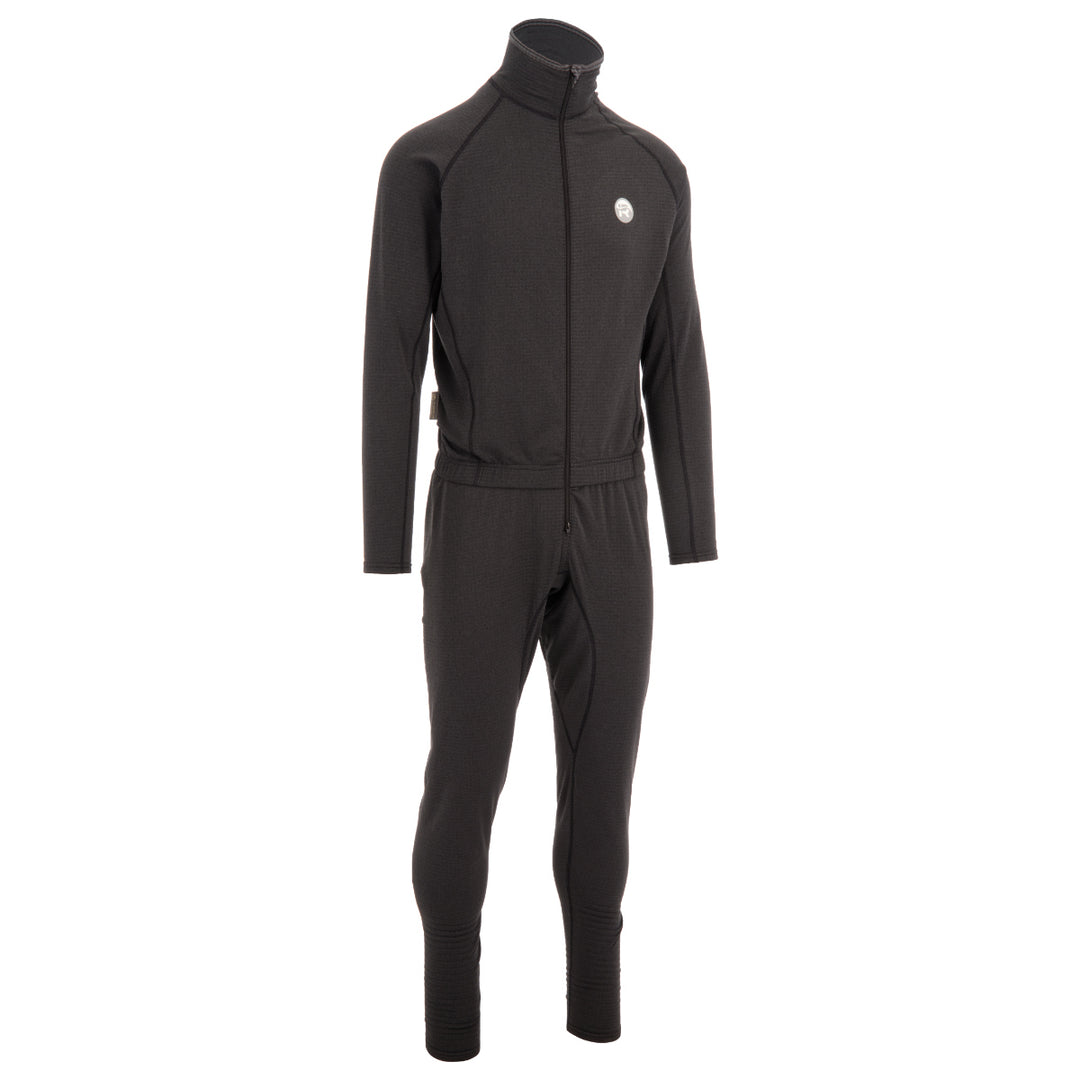 The Immersion Research Debrief Union Suit is a black full-body thermal suit with Polartec Power Grid fleece, long sleeves, zip front, high collar, and fitted ankles, shown on a plain white background.