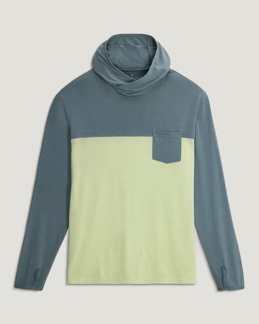 The Free Fly Men's Bamboo Hybrid Hoodie features long sleeves, a hood, thumbholes, a chest pocket, UPF protection, and color blocking with a teal upper and light yellow lower section.