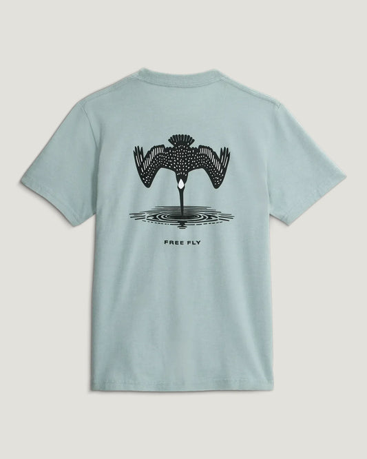 The Youth Dive Bomb Tee by Free Fly is a light blue t-shirt featuring a black bird in flight over water with "FREE FLY" on the back—perfect for pelican shirt fans and anyone who loves unique, soft designs.