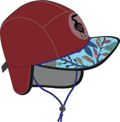 A Nobdody's neoprene skull cap with a bird resting on it.