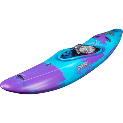 A side view of the Jackson Kayak Gnarvana whitewater kayak in blue and purple, featuring a padded seat and footrests, shown on a white background.