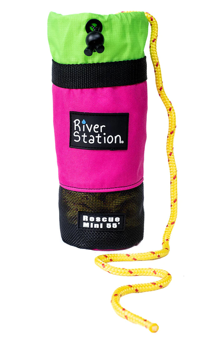 A brightly colored River Station Gear Kayak/Packraft Throw Bag - 55' with a quick-drying rope for river station rescue.