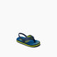 A single REEF LITTLE AHI Children's Flip Flop, blue and green striped with a back strap, displayed at an angle on a white background—ideal for toddlers needing comfortable, stylish sandals.