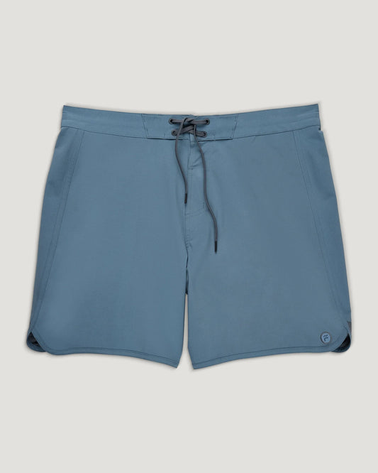 The Free Fly Dawn Patrol Boardshort- M's features side pockets and a subtle logo on the left leg, shown against a plain light background.