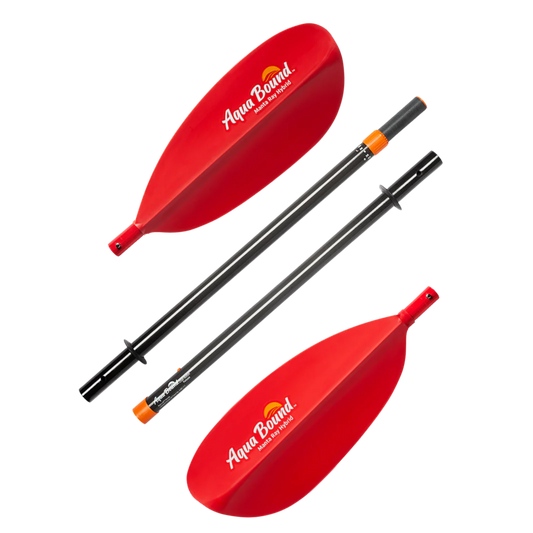 A pair of red AquaBound Manta Ray Hybrid 4-Piece paddles on a black background, known for being lightweight and perfect for high angle strokes.