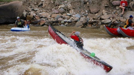 Mark Quenelle canoeing through Smelter Rapid.