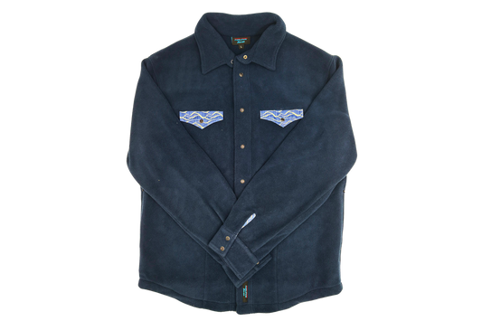 The FunLuvin' Fleecewear FunLuvin' Fleece Pearl Snap M's is a navy blue, adventure-ready fleece jacket with button closure and two chest pockets with blue and white patterned flaps, shown on a white background.