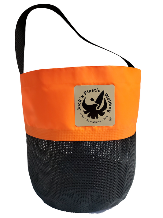 The orange and black Collapsible Water Bucket by Jacks Plastic Welding, ideal for outdoor adventures, features a sturdy black strap and square logo label. Its mesh bottom is perfect for drying gear, adding both functionality and style to your adventure essentials.