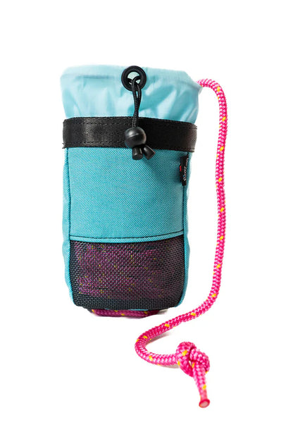 The River Station Gear PFD Throw Bag is a blue and black pouch with mesh pocket, drawstring closure, and pink-yellow braided floating rope—perfect as a compact throw bag or accessory for your Astral Rescue PFD.
