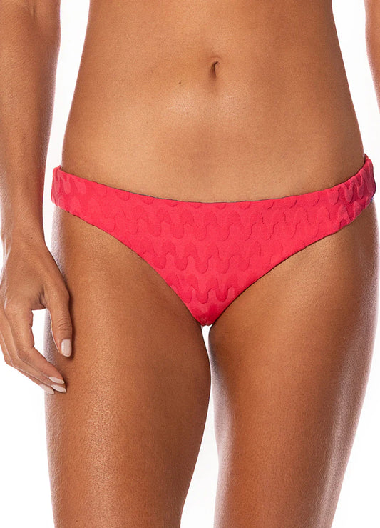 A person modeling Maaji's Iconic Bottom bikini in textured red, shown from midriff to upper thighs against a plain background.