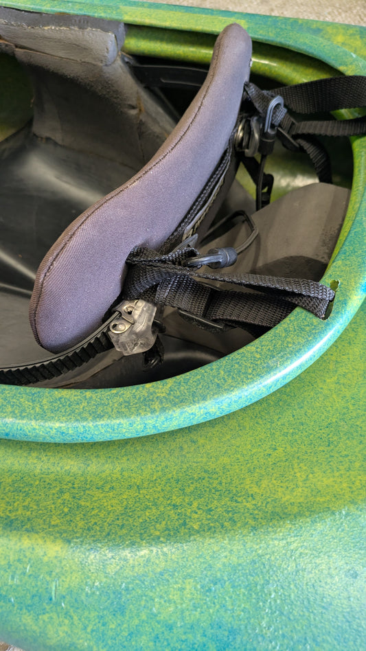 Close-up of the seat and backrest in a Barely used, nearly virgin Dagger Sawblade Outburst by 4Corners Riversports, highlighting black straps and adjustment features.