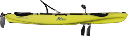 A yellow Hobie kayak with excellent stability and two Hobie paddles attached to it.