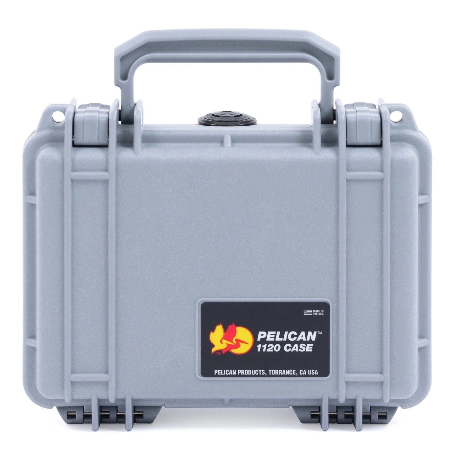 The gray 1120 Case with a handle and black label, featuring the Pelican logo and company information, is a watertight case with secure latches designed for protective storage. It includes an automatic pressure equalization valve for added protection.
