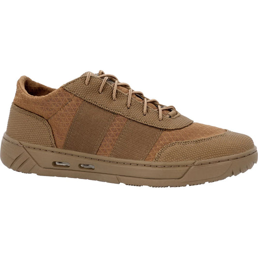 The Coronado Low by Rocky Brands Inc. is a brown casual sneaker with a textured fast-drying mesh upper, lace-up closure, and a rubber sole featuring two small ventilation holes on the side.