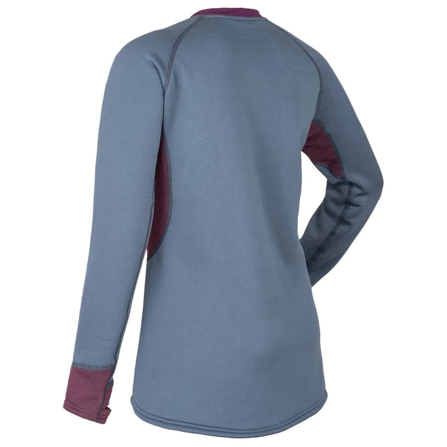 The back of a woman's Immersion Research Susitna Pullover jacket in blue and red.