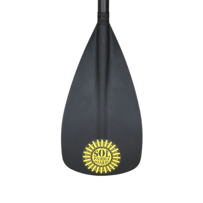 The Carbon Blaster 3-Piece Travel SUP Paddle from SOL Paddle Boards features a carbon shaft, adjustable design, and bears the brand's yellow logo at its base.