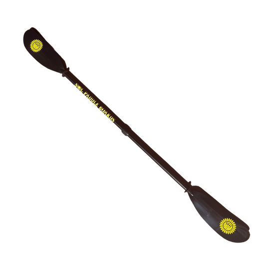 The SOL Paddle Boards SOL Sweep Kayak Paddle - 4 Piece is a black double-bladed paddle featuring yellow sun designs on each blade and text along the shaft, shown against a white background.