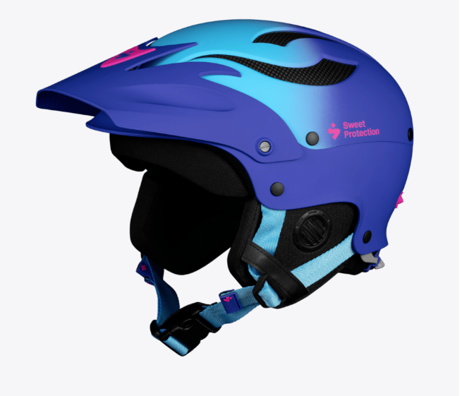 The Sweet Protection Rocker Helmet is a blue and purple whitewater helmet with a visor, black interior padding, and an adjustable chin strap.
