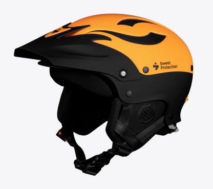 The Sweet Protection Rocker Helmet is black and orange with a flame design, visor, TLC Shell Technology, padded ear covers, and an adjustable chin strap.