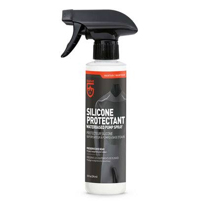 A bottle of Gear Aid Silicone Protectant with a black trigger nozzle and front-facing label, perfect for waterproofing and protecting watersports gear.