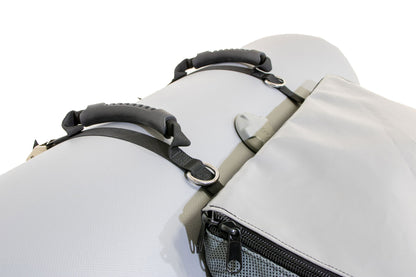 Close-up of the AIRE Thwart Mesh Gear Bag, a light gray water-resistant bag with black handles, metal rings, and a partially visible front zipper pocket shown against a white background.