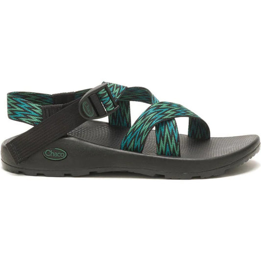 The Chaco Z1 Classic - Men's sandal in black and teal features adjustable straps and a textured rubber sole, shown from the side—ideal for outdoor enthusiasts who value comfort and style.