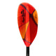 Close-up of an AquaBound Whiskey kayak paddle featuring a red and orange fiberglass blade, black shaft, and visible brand logo.