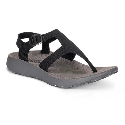 The Women's Albion Sandal by Tread Labs features a black strappy design with a durable rubber outsole, adjustable buckle, textured gray footbed, and speckled gray sole.
