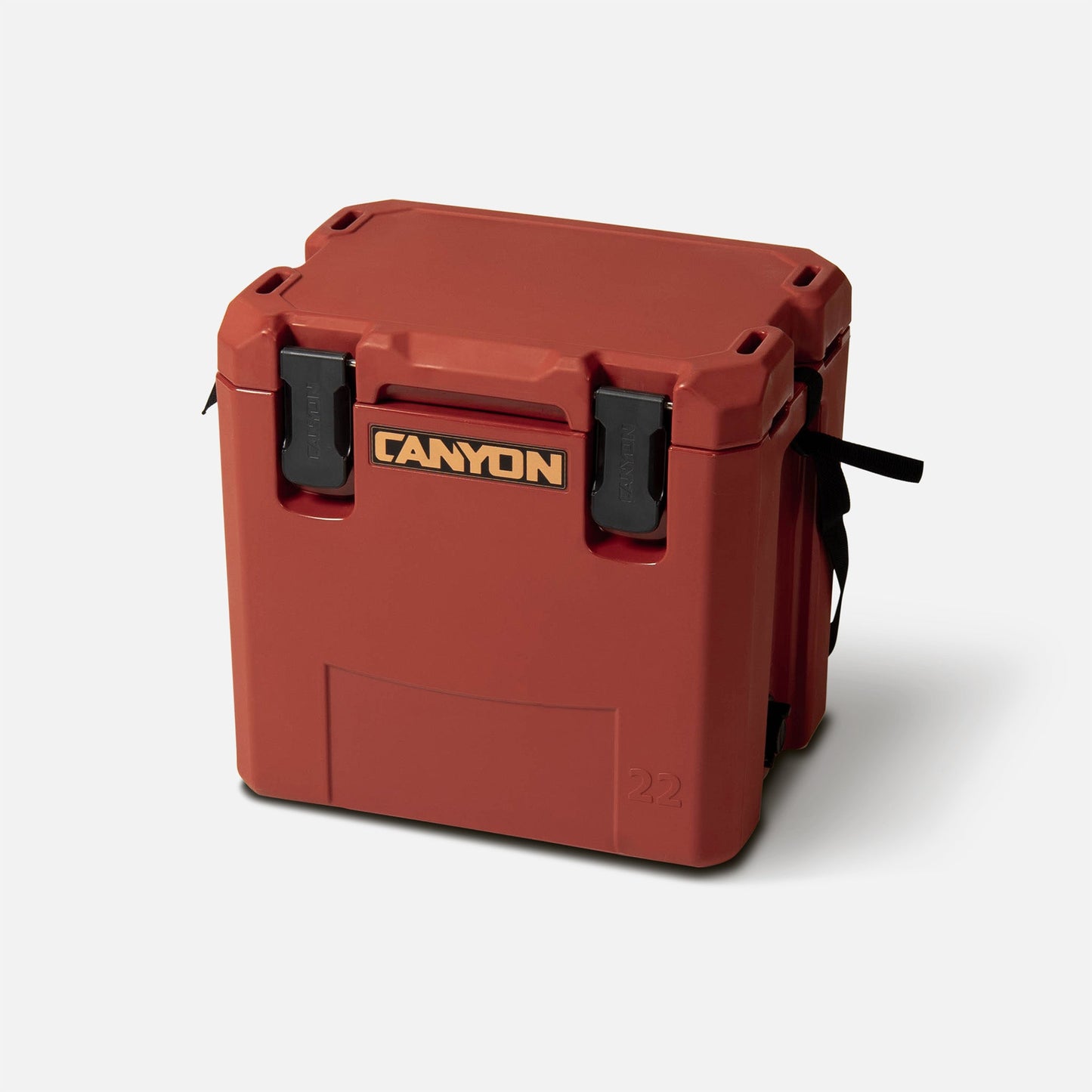 A red Canyon Coolers Outfitter 22 V2 Cooler, a compact day cooler with black latches and handles, is set against a plain white background.