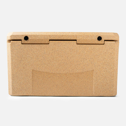 The tan, rectangular Outfitter V2 Series Cooler by Canyon Coolers is crafted from premium sun-resistant polymer and shown with a closed lid against a pristine white background.
