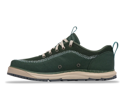 The Astral Brewer 3.0 is a green low-top sneaker made from hydrophobic canvas, featuring white stitching, beige laces, and a beige sole. Perfect for kayakers, it includes two metal side eyelets and a heel loop.