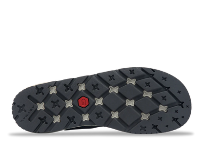 The Brewer 3.0 by Astral features a black water shoe sole with a rugged tread of hexagonal and star-shaped elements, ideal for kayakers. A red hexagon logo is centered, and its hydrophobic canvas ensures quick drying.