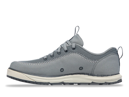 The Astral Brewer 3.0 offers a stylish gray sneaker with hydrophobic canvas, white and blue outsole, detailed stitching, and metal eyelets—perfect for kayakers seeking functionality and style.