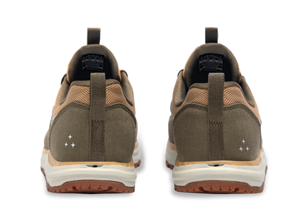 The Astral Brewer 3.0 sneakers, designed like hydrophobic canvas water shoes, have white soles and small reflective details. The brown sneakers are perfect for kayakers seeking both style and function, shown from the back against a plain background.