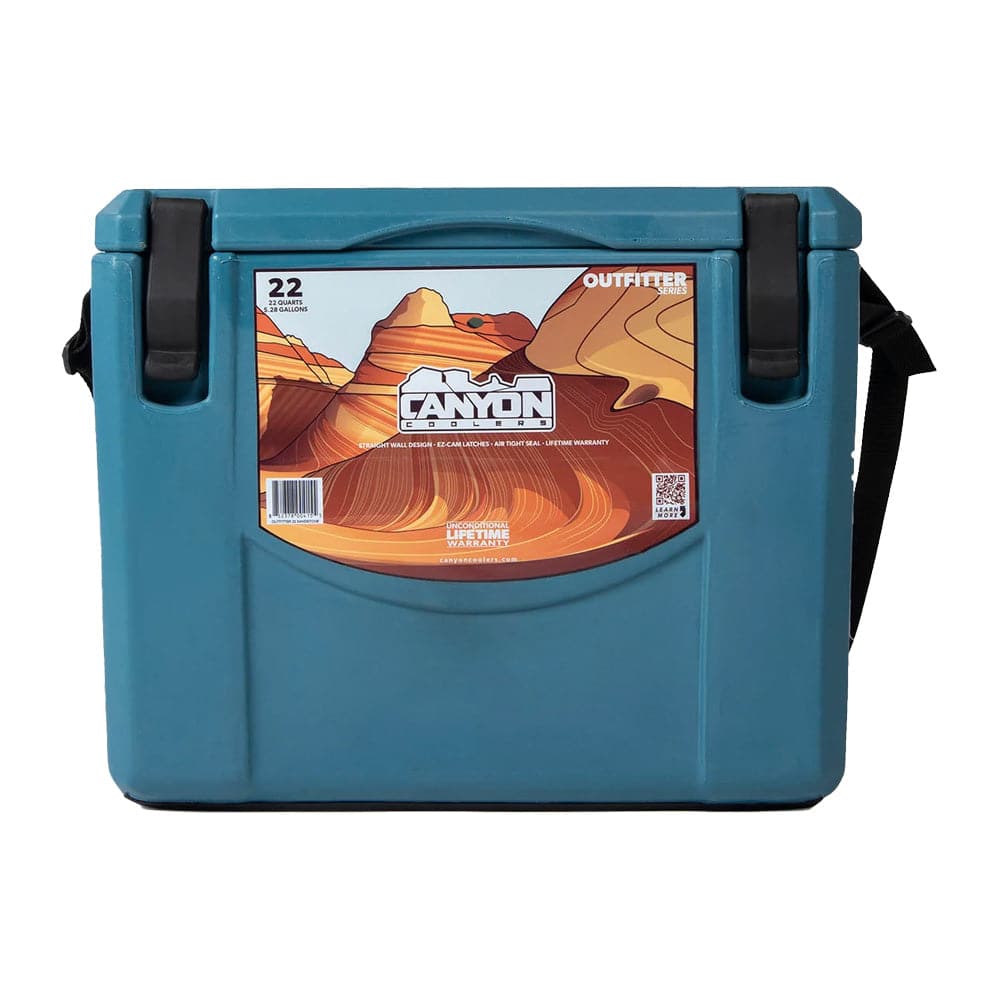 A blue Canyon Outfitter 22 Cooler with a mountain scene on it.