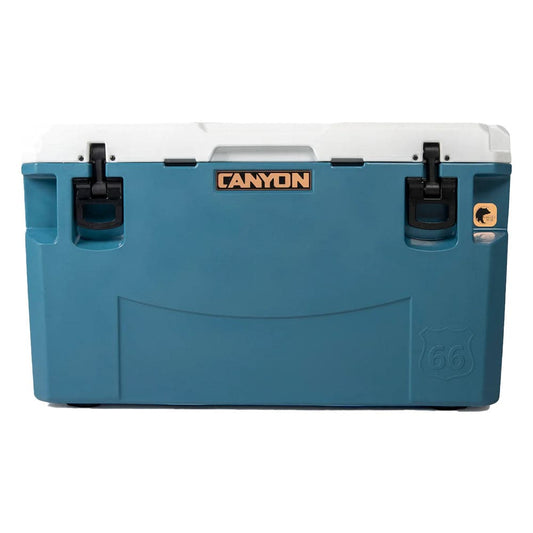 A Canyon PRO Series Cooler in blue and white on a white background.