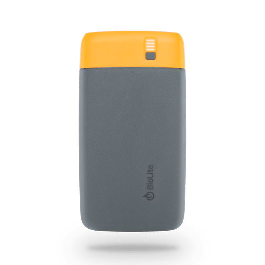 The BioLite Charge 40 PD Power Bank is a gray and yellow portable charger with a visible battery indicator and BioLite branding on the front, offering fast charging. It is shown against a plain white background.