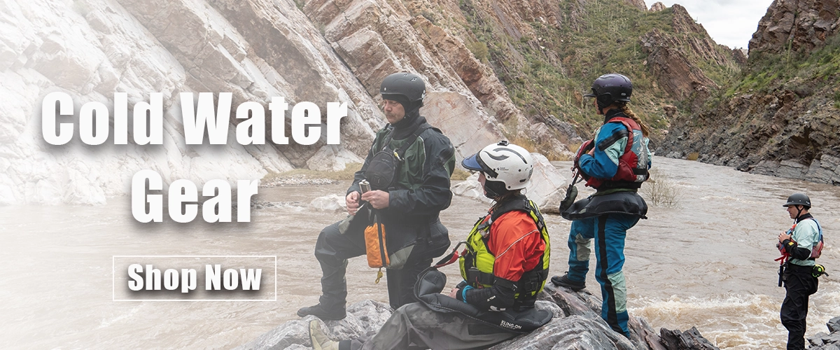 Four people scouting Quartzite Falls on the Salt River in Arizona. They are wearing drysuits, pfd's, helmets, and gear needed to whitewater kayak and raft. Text says "cold water gear". Text box says "shop now"