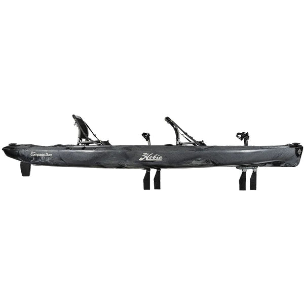 A Hobie Mirage Compass Duo 13'6 sit on top pedal drive kayak on a white background.