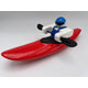 The Foamie Creeker from the Foamie Friends collection features a toy figurine donning a blue helmet, seated in a red kayak with black paddles against a white background, perfect for endless river play adventures.