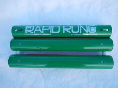 A green tube with the brand name Rapid Rung on it.