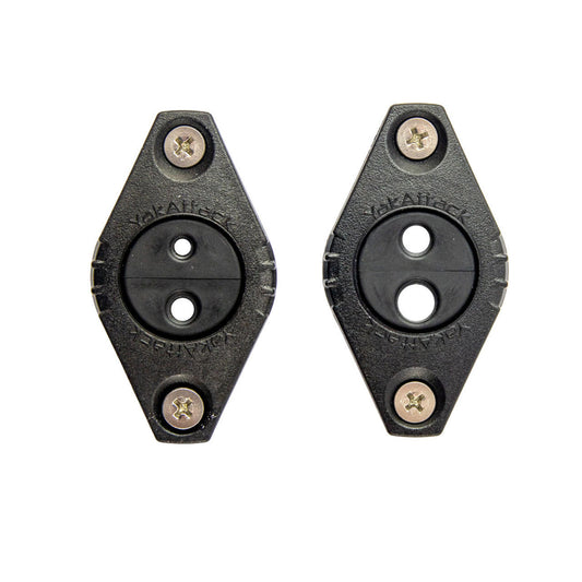 Two black oval plastic brackets with two central holes and metal screws, shown side by side for YakAttack GridLoc Through Hull Wiring Kit—compatible with BlackPak Pro for kayak through hull wiring.