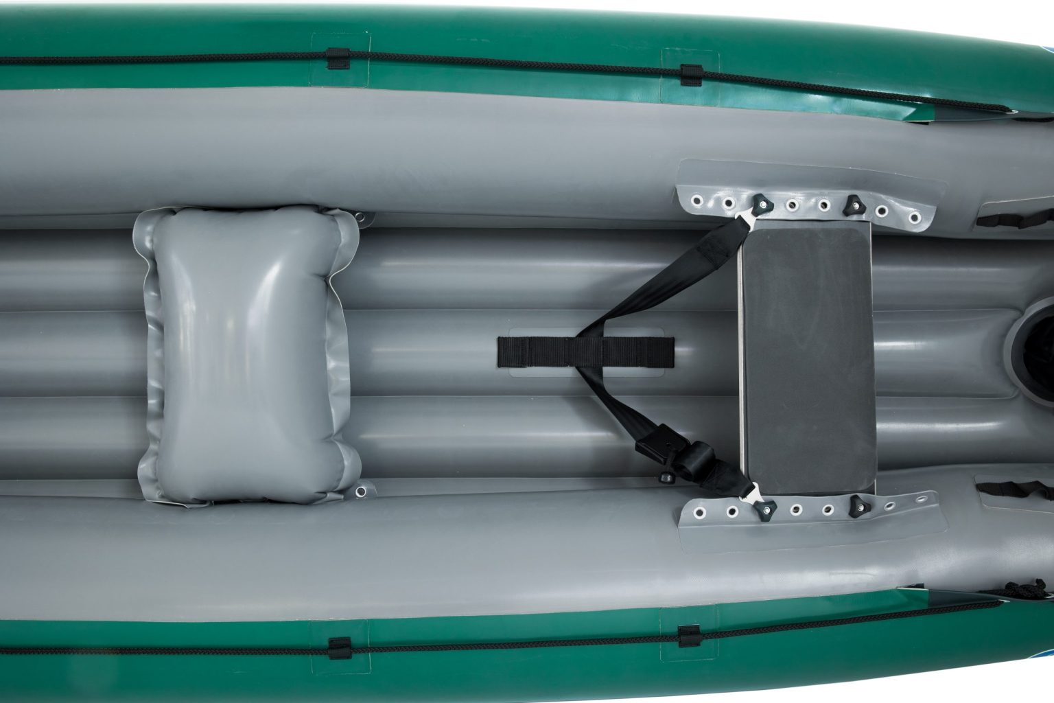 Top view of the Gumotex Baraka Inflatable Canoe in gray with a green exterior, showcasing seating areas, one featuring a padded seat, and black straps securing various components. This whitewater canoe is designed with a self-bailing bottom for added safety and convenience.