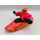 The Foamie Friends Swirl Play Foamie Boaters features a toy figure in bright pink gear with an orange helmet, sitting in a colorful plastic boat and holding a black double-bladed paddle—ready for fun adventures.