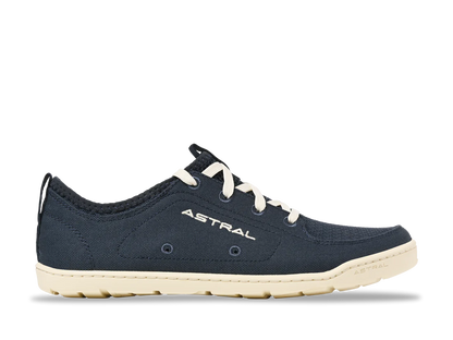 A navy blue casual sneaker with white laces and a beige sole, the "Loyak - Women's" by Astral offers a durable design. The word "Astral" is printed on the side, making it ideal for both urban strolls and kayaking adventures.