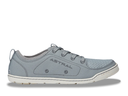 The Loyak - Women's sneaker by Astral, perfect for kayaking, features "ASTRAL" on the side. It has textured fabric, a lace-up design, and a white FlexGrip sole. Left side view.