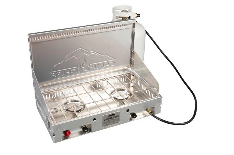 A portable Camp Chef Mountaineer Camp Stove with a hose attached to it, perfect for an outdoor kitchen while camping or for mountaineer camps.